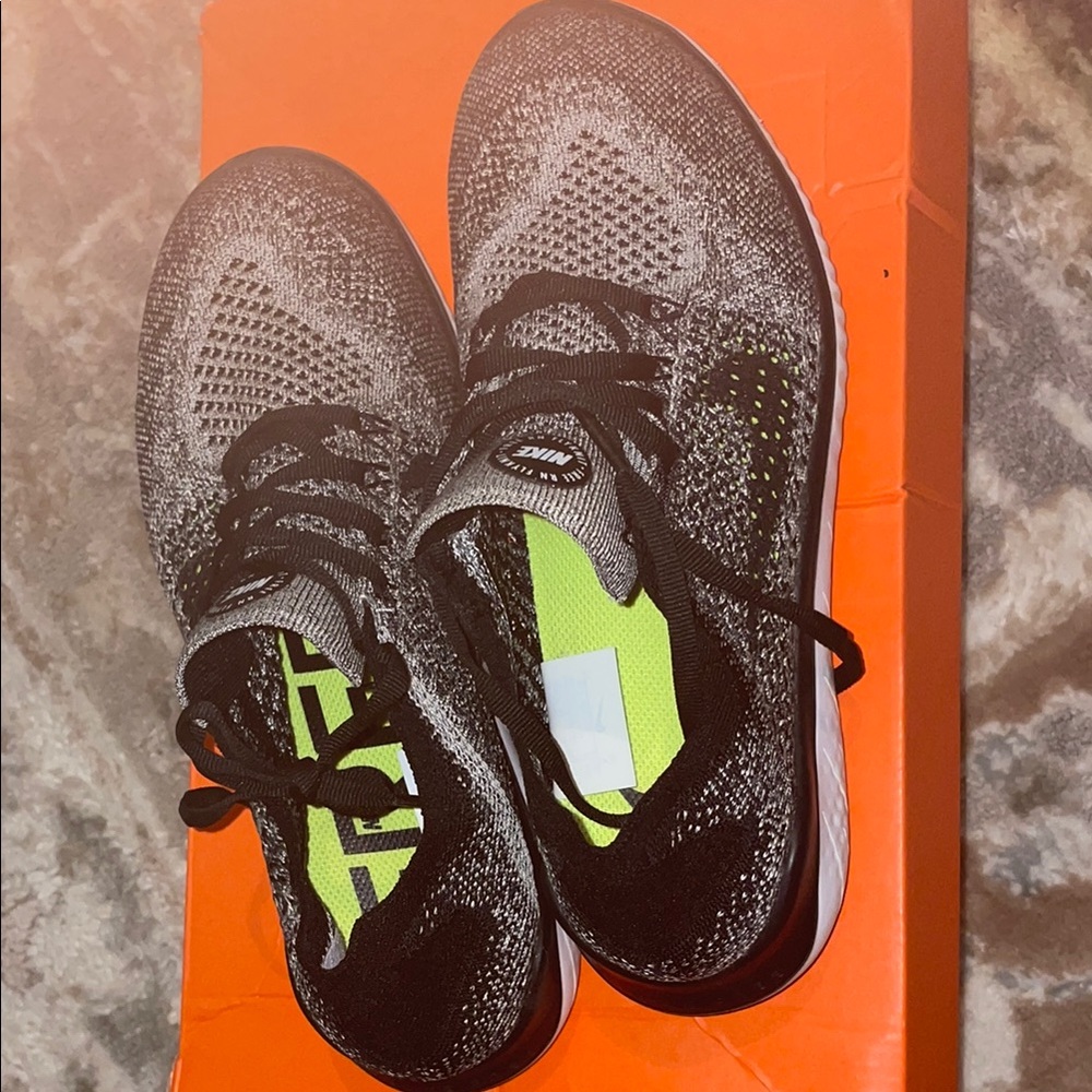 Nike Black and Gray Athletic Shoes with Breathable Knit Design